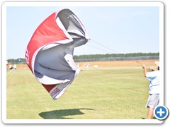 Andrew Yurkovich has fun “flying” a tent canopy in the strong winds