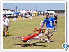 Some sports flyers get ready to fly in the wind