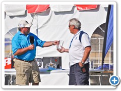 Event Director Matt Klos Hands Darell Sprayberry his award for Best of Show in Helicopters for his OH 58A.