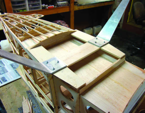 Sheeting the fuselage of the Stinson SR-9