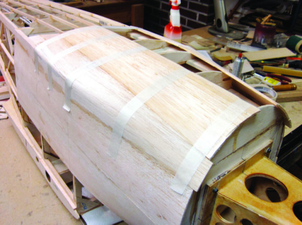 Sheeting the fuselage of the Stinson SR-9