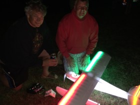 Chris Shaw and Mike Siemonsen ready the Multiplex Fun Cub for some night float flying at Joe Nall.