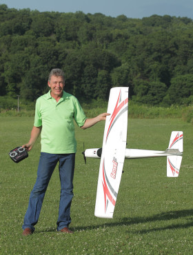 Fly RC Test Pilot, David Baron, holds the Sensei up for a photo op before takeoff.