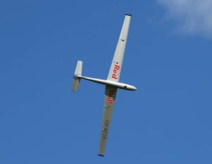 This photo looks like and overhead pass, but I’m actually coming by knife edge to show off the aerobatic capabilities of my SebArt Blanik